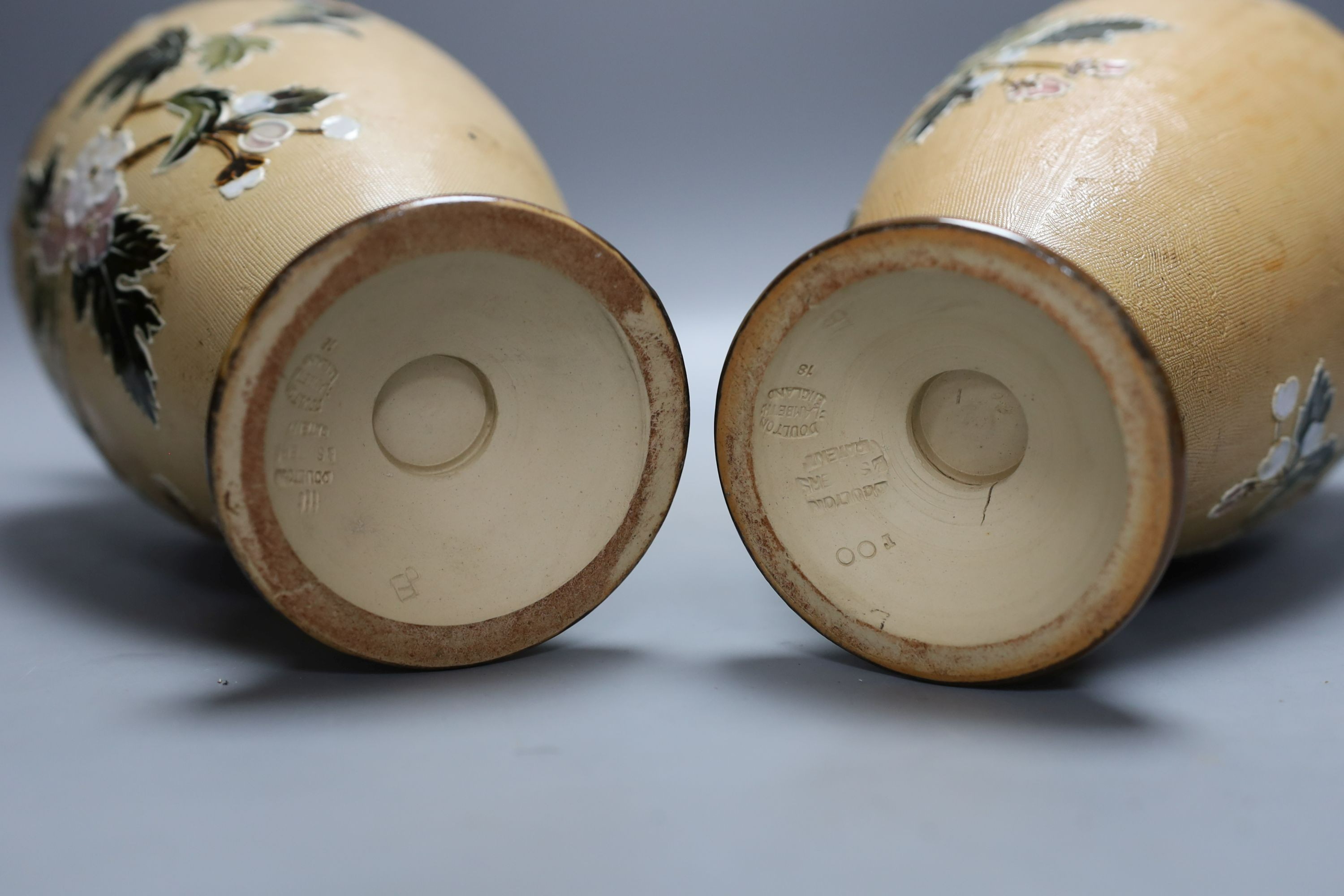 A pair of Doulton Lambeth vases, c.1900, 30cm tall